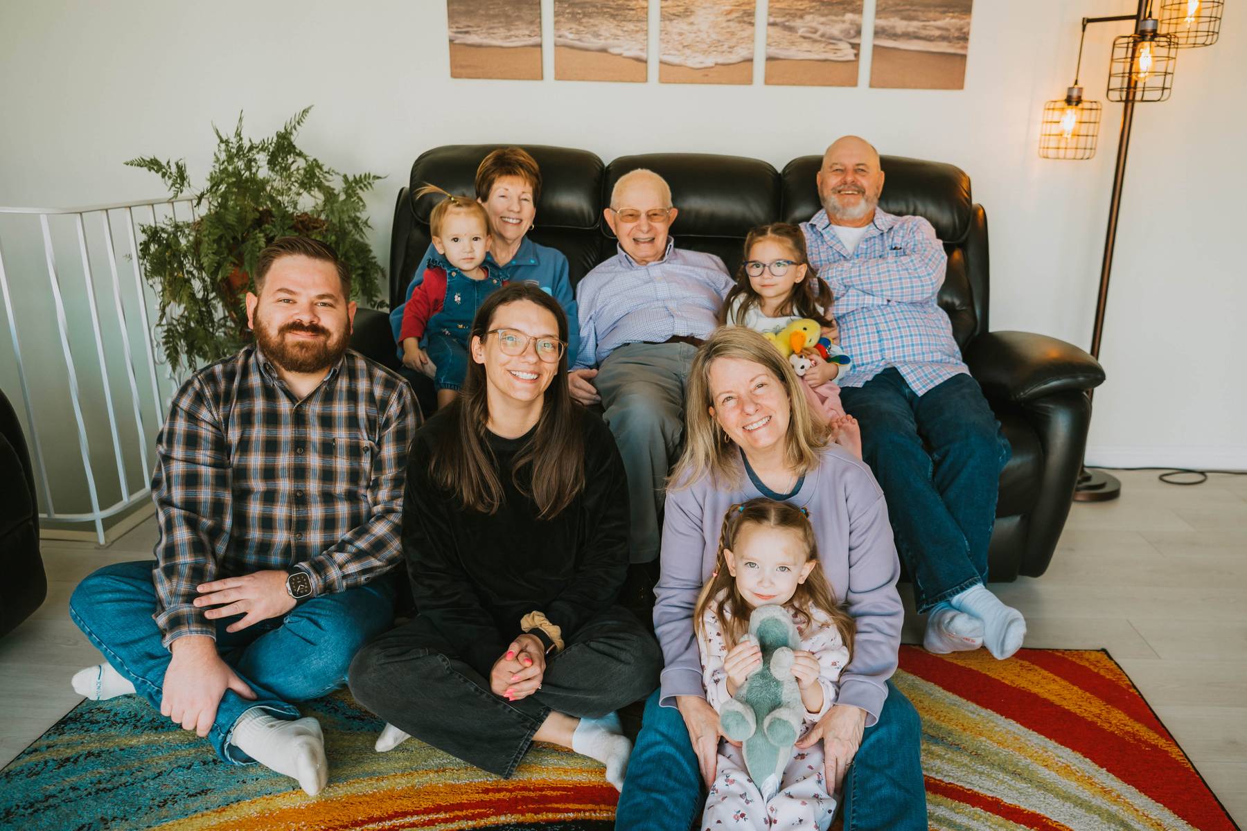 amazing pictures of mom and her husband while they wait for their newborn and other babies to connect while shooting in the wonderful beauty of the mountains with friends