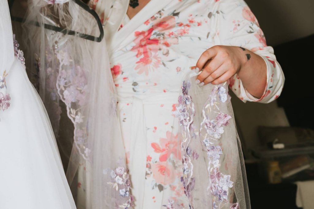 bride with veil on wedding morning in utah