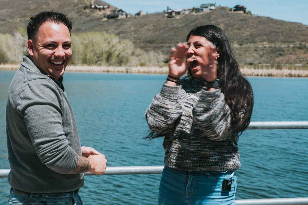 Complete surprise reaction captured during spring engagement session in Utah